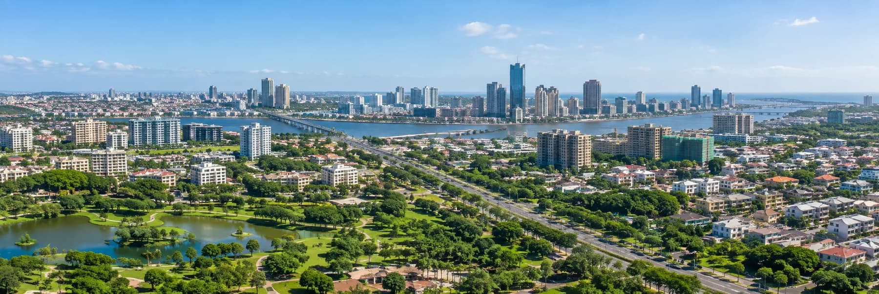 Modern city skyline with green residential spaces